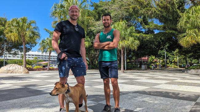 Cairns resident Colin Day and friend Jerry Vereeken walk dog, Buster, along the only footpath of the Esplanade open to dogs. Photo: Kate Stephenson