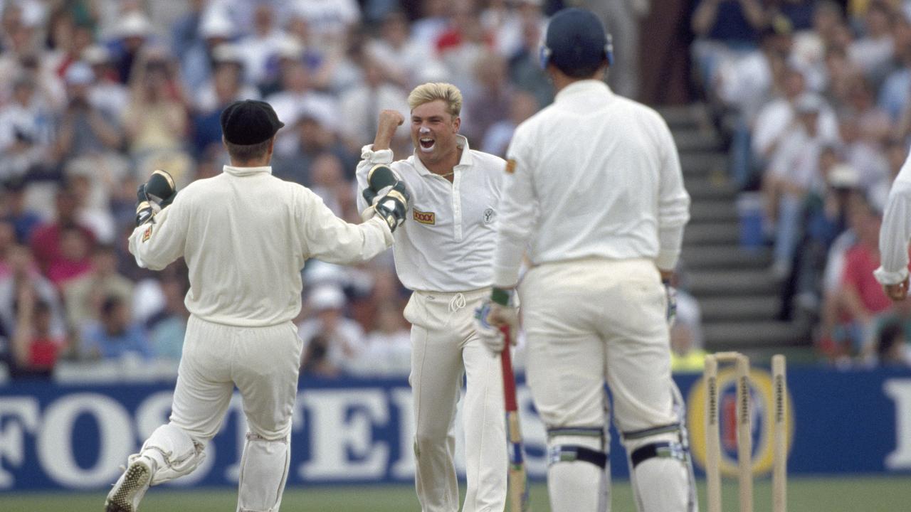 Australian Shane Warne celebrates what would become known as the “Ball of the Century” with Australian wicketkeeper Ian Healy after bowling batsman Mike Gatting for 4 during the second day of the 1st Test between England and Australia at Old Trafford in Manchester, UK. June 4, 1993. Picture: Getty Images