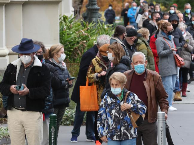 People line up to get their COVID-19 vaccinations at the Royal Exhibition building. Friday, May 28, 2019. Picture: David Crosling