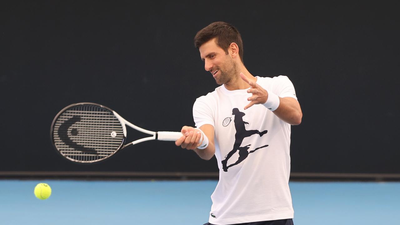 Novak Djokovic was all smiles as he trained at Memorial Drive in Adelaide on Wednesday. Picture: NCA NewsWire / David Mariuz