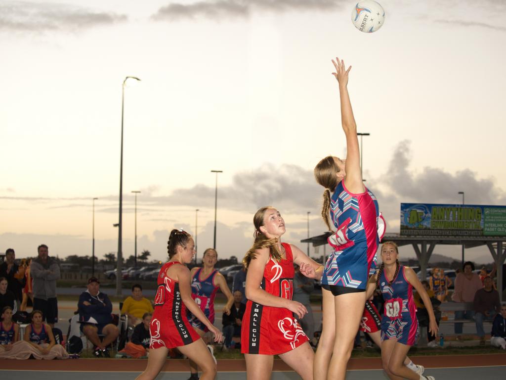 Lulu Milfull of Storm jumps with DAS player, Phoebe Frances up for the challenge in the 2021 Mackay Netball Association seniors grand final. September 4th, 2021 Picture: Marty Strecker