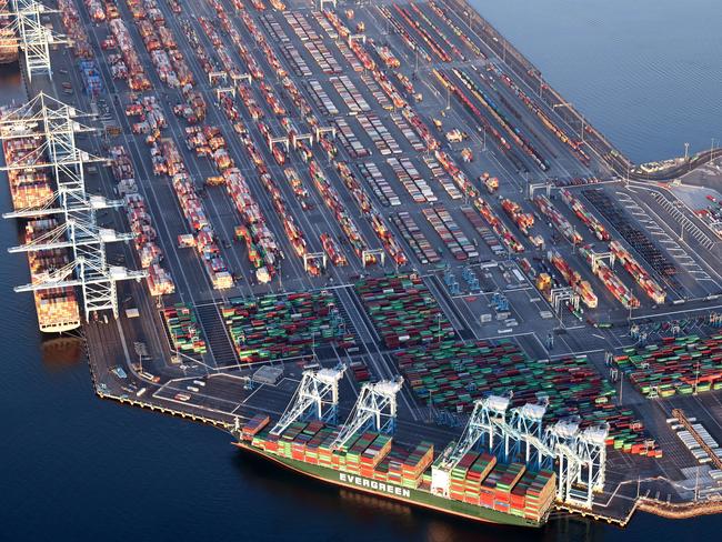 LOS ANGELES, CALIFORNIA - SEPTEMBER 20: In an aerial view, container ships and shipping containers are seen at the Port of Los Angeles on September 20, 2021 near Los Angeles, California. Amid nationwide record-high demand for imported goods and supply chain issues, the twin ports of Los Angeles and Long Beach are currently seeing unprecedented congestion. On September 17, there were a record total of 147 ships, 95 of which were container ships, in the twin ports, which move about 40 percent of all cargo containers entering the U.S.   Mario Tama/Getty Images/AFP == FOR NEWSPAPERS, INTERNET, TELCOS & TELEVISION USE ONLY ==