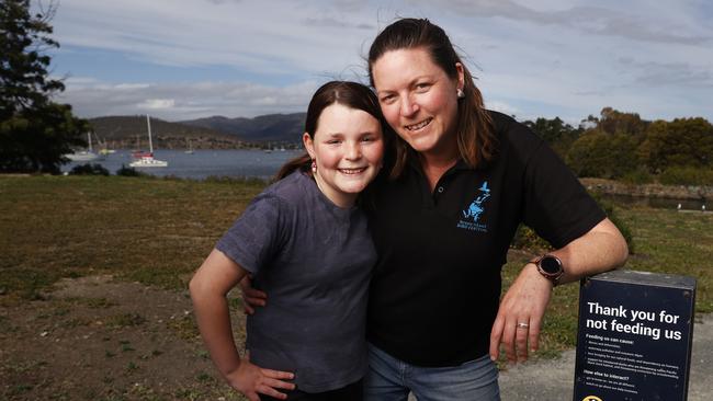 Maddy Thurstans 11 with mum Dydee Mann who both volunteer with the group. Pacific Black Duck Conservation Group who have been helping with the removal of non native ducks and geese at the Hobart Rivulet at Lutana. Picture: Nikki Davis-Jones