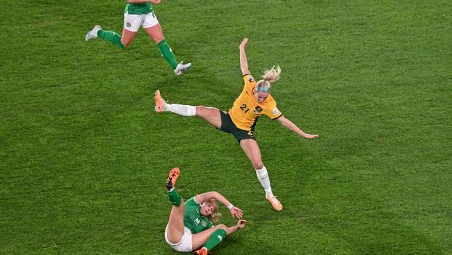 Ellie Carpenter (C) and Ireland midfielder Ruesha Littlejohn (bottom) collide. Picture: AFP