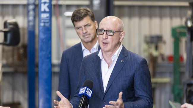 Luke Howarth, pictured with Angus Taylor in 2023, has conceded his seat of Petrie. Picture: Matthew Poon