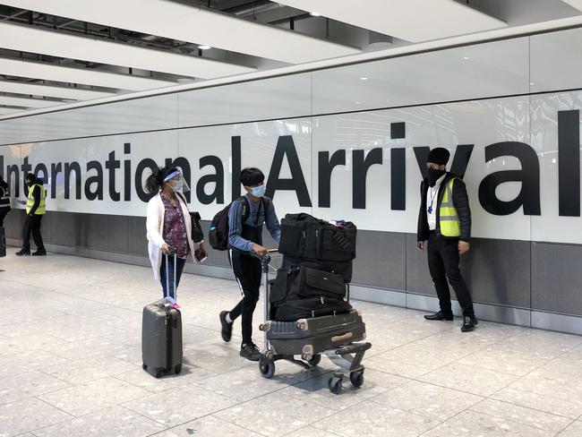 Passengers are escorted through the arrivals at Heathrow Airport in London. British travellers could soon be heading back to Europe. Picture: Getty Images