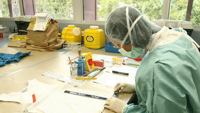 A scientist working at Brisbane’s forensic centre.