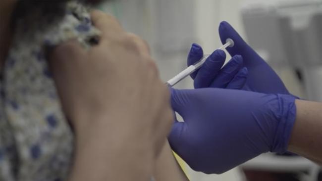 Dr Edward O’Neill is injected with the potential coronavirus vaccine. Picture: Oxford University