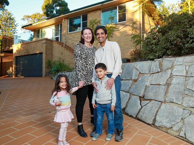 Karyn Benness and Kevin Gunasekera, with twins Zoe and Lucas, are selling a large home in the boom suburb of Allambie Heights. Picture: Justin Lloyd