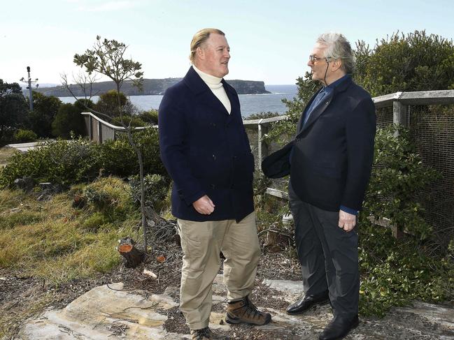 James Hanson, who is a descendant of survivor James Johnson’s brother, speaks with iconic Australian film director and Watsons Bay resident George Miller. Picture: John Appleyard