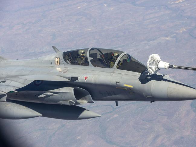 A French Rafale jet refuels mid-air about 100km south of Darwin. Picture: Floss Adams.