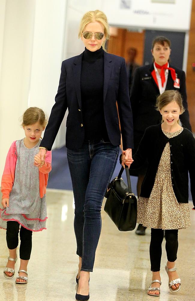 Nicole Kidman arrives in Sydney in 2016 with her daughters. Picture: John Grainger