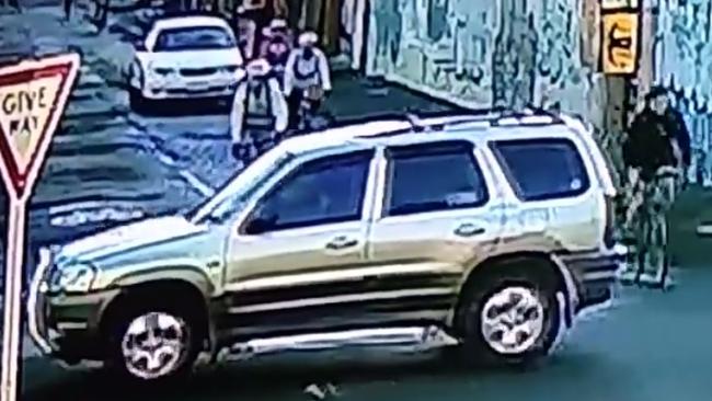 A still from the video showing an SUV backing into a cyclist in Brunswick. Picture: Facebook