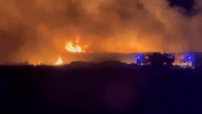 More than 37 fire trucks and over 100 firefighters were called to the fire. Video: Ryan Bourke