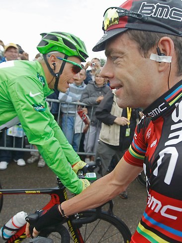 <p>Cadel Evans and Philippe Gilbert of Belgium wait for the start of the seventh stage from Le Mans to Chateauroux. Picture: AP</p>