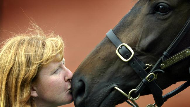 Strapper Donna Stewart with Makybe Diva the day after she won the 2003 Melbourne Cup. Picture: Kelly Barnes