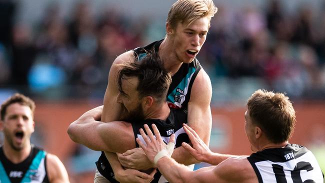 Dixon and Todd Marshall after a Power goal. Picture: Daniel Kalisz (Getty).