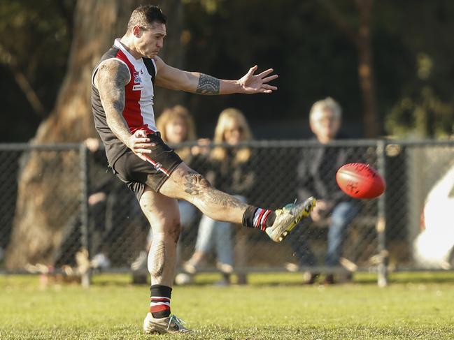 Aaron Edwards kicks a goal for St Kilda City. Picture: Valeriu Campan