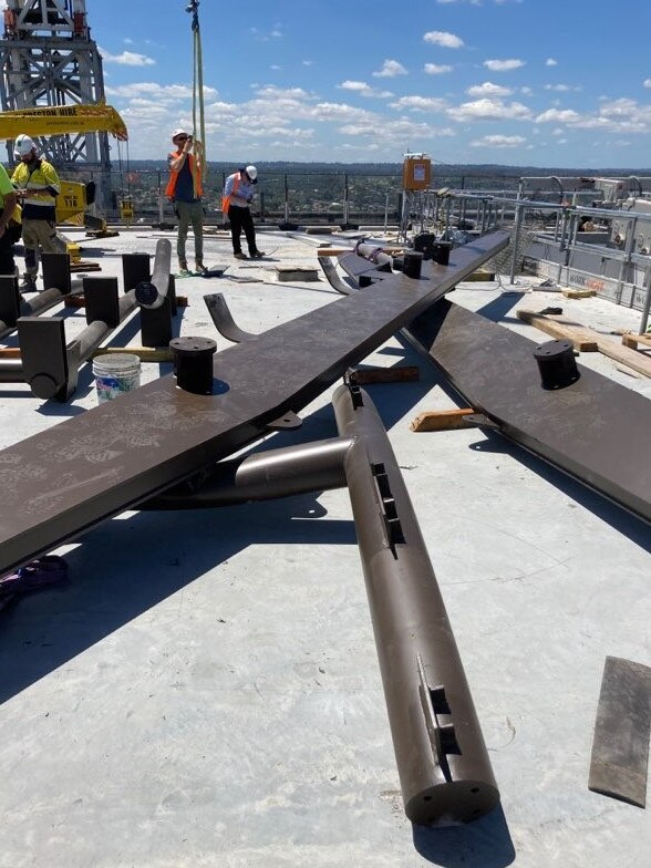 A 2 tonne beam which fell at from a crane at a skyscraper on Smith and Phillip St, Parramatta last November barely missed workers.