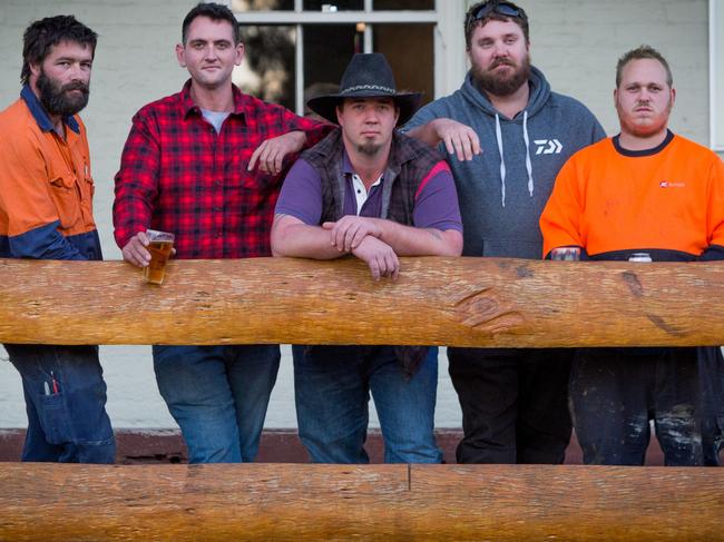 Tiler Joel Walters (centre), was so moved by our story last week about farmer Steve Germon, he has rallied 10 friends including Scott O’Brien, Joshua Ireald, Simon MacMillan, and Lachlan Jones, to go help on Mr Germon’s farm. Picture: Liam Driver