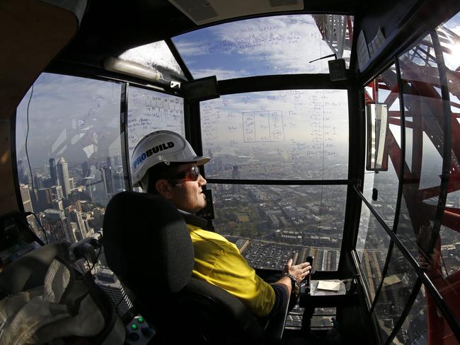 Crane operator Pino Niccoli at work high above the city. Picture: David Caird