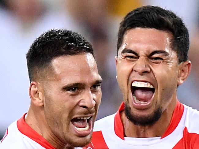 BRISBANE, AUSTRALIA - MARCH 28: Corey Norman of the Dragons is congratulated by team mates after kicking the winning field goal during the round 3 NRL match between the Brisbane Broncos and the St George Illawarra Dragons at Suncorp Stadium at Suncorp Stadium on March 28, 2019 in Brisbane, Australia. (Photo by Bradley Kanaris/Getty Images) *** BESTPIX ***