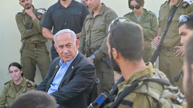 Prime Minister Benjamin Netanyahu is pictured on October 15 at a Golani training base targeted by a deadly Hezbollah drone strike one day earlier. Picture: GPO.