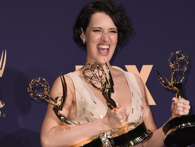 TOPSHOT - British actress Phoebe Waller-Bridge poses with the Emmy for Outstanding Writing for a Comedy Series, Outstanding Lead Actress In A Comedy Series and Outstanding Comedy Series for 