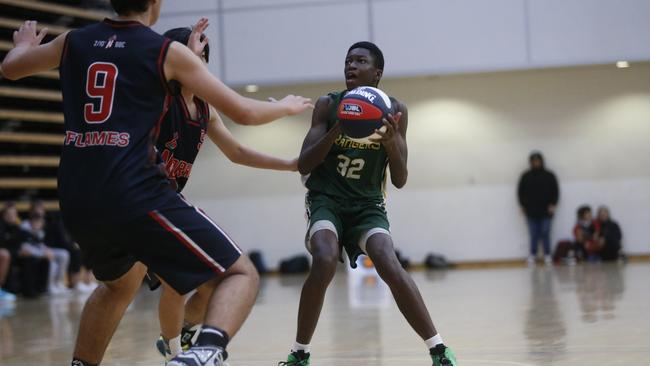 John Efunkanbi looks for his shot for Dandenong. Picture: Valeriu Campan