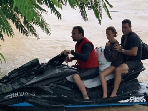 Joel Parkinson ferries grateful flood-stranded residents.