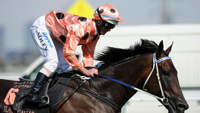 Jockey Luke Nolen rides Black Caviar to victory in the $500,000 Group 1 race Black Caviar Lightning at Flemington. Picture: Joe Castro