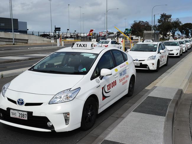 Taxi line up in the rank at the Adelaide Airport. Picture: MICHAEL MARSCHALL