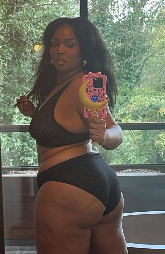 Lizzo strips off to show off her weight loss.