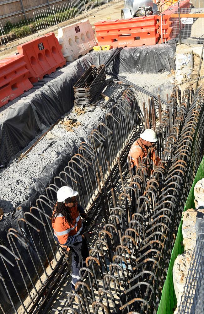 Workers build sky rail on the Cranbourne-Pakenham line. Picture: Chris Eastman
