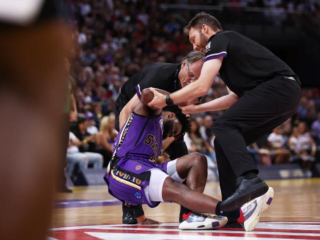 Derrick Walton Jr had to be helped from the floor late in the Kings’ clash with New Zealand. Picture: Getty Images