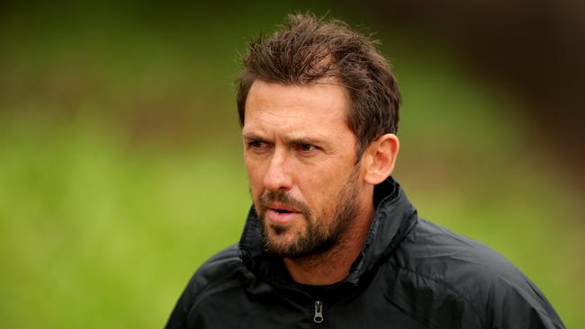 Coach Tony Popovic during warm up for their training session for their game against Guangzhou Evergrande at Pirtek Stadium .Picture Gregg Porteous