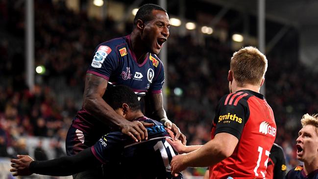 CHRISTCHURCH, NEW ZEALAND - JUNE 03: Suliasi Vunivalu of the Reds celebrates with Filipo Daugunu of the Reds after his try during the Super Rugby Pacific Quarter Final match between the Crusaders and the Queensland Reds at Orangetheory Stadium on June 03, 2022 in Christchurch, New Zealand. (Photo by Joe Allison/Getty Images)