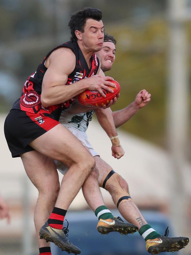 Kyabram’s Lachlan Smith pulls in a chest mark.