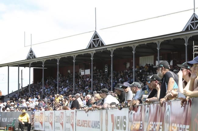 Fans packed the ground in front of the Fos Williams stand for the Power’s games against North Melbourne at Alberton Oval. Picture Sarah Reed