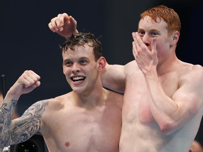 TOKYO, JAPAN - JULY 28: Matthew Richards and Tom Dean of Team Great Britain react during the Men's 4 x 200m Freestyle Relay Final on day five of the Tokyo 2020 Olympic Games at Tokyo Aquatics Centre on July 28, 2021 in Tokyo, Japan. (Photo by Tom Pennington/Getty Images)