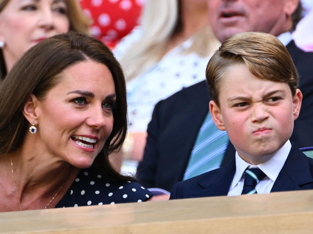 Britain's Catherine, Duchess of Cambridge (L) talks to her son Prince George as they attend the men's singles final tennis match between Serbia's Novak Djokovic and Australia's Nick Kyrgios. Picture: AFP