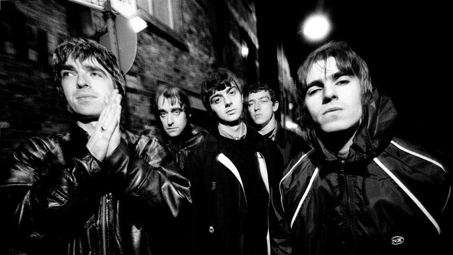 Oasis in 1993: Noel Gallagher, Paul Arthurs (aka Bonehead), Paul McGuigan, Tony McCarroll and Liam Gallagher. Picture: James Fry/Getty Images