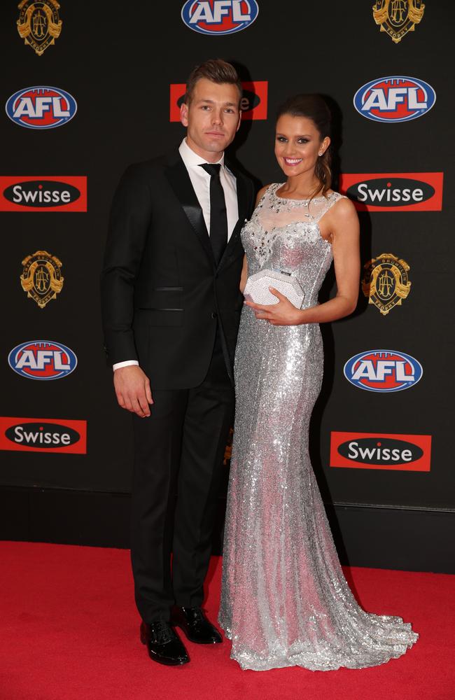 Shaun Higgins of North Melbourne and partner Heidi Greig arrive on the red carpet for the 2015 AFL Brownlow Medal presentation held at Crown Casino on Monday, September 28, 2015, in Melbourne, Victoria, Australia. Picture: Tim Carrafa