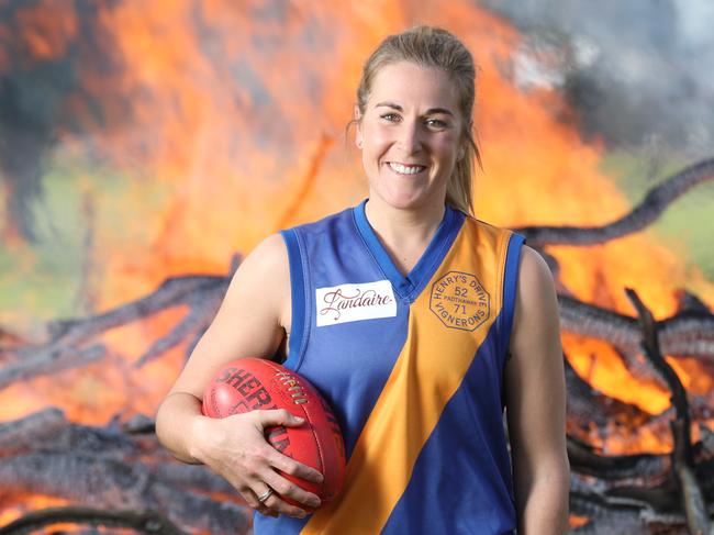 5.6.2019.Casey McElroy, 27, on the family farm at Marcollat with her dad Bradley,52 and grandfather Jeffrey,81.Casey  played in the men's reserves footy team for Padthaway last month and the club has been fined $1000. PIC TAIT SCHMAAL.