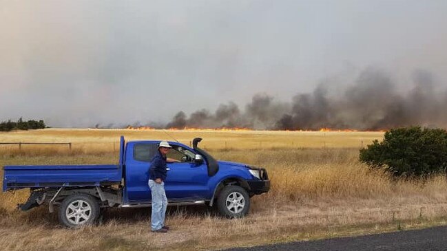 A man watches the Lucindale fire from a distance. Picture: NCA NewsWire