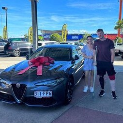 Amelia and Mike Luker with the brand new car that was stolen. Picture: supplied