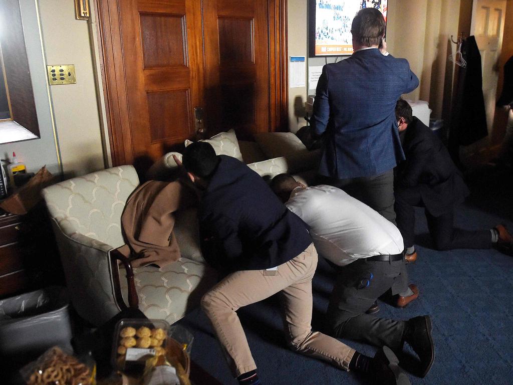 Congress staffers were forced to barricade themselves in rooms as Trump supporters tried to stop the Electoral College vote count. Picture: Olivier DOULIERY / AFP