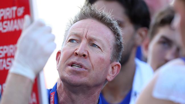 Coach David Noble speaks to his players at quarter-time at Metricon Stadium. Picture: Getty Images