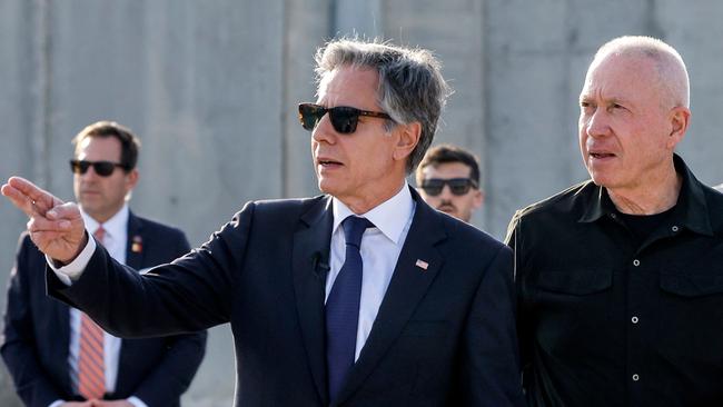 US Secretary of State Antony Blinken walks with Israeli Defence Minister Yoav Gallant (R) at the Kerem Shalom border crossing with the Gaza Strip in southern Israel. Picture: AFP.