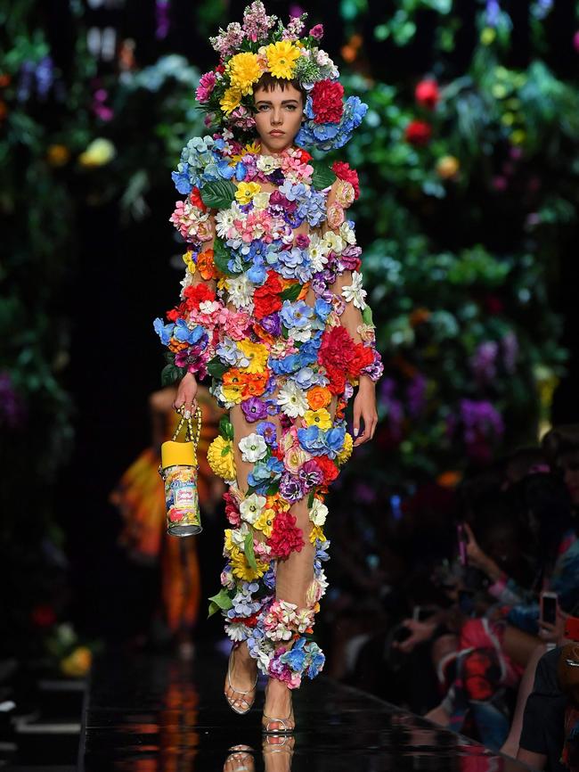 Jeremy Scotts collection for Moschino included a bouquet of looks inspired by flowers, from an orchid to a floral bouquet to a bunch of roses. Picture: AFP